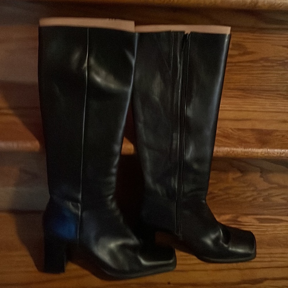 Leather upper (knee hi boot) made in Brazil. Square toe and 2 3/4 block heel.